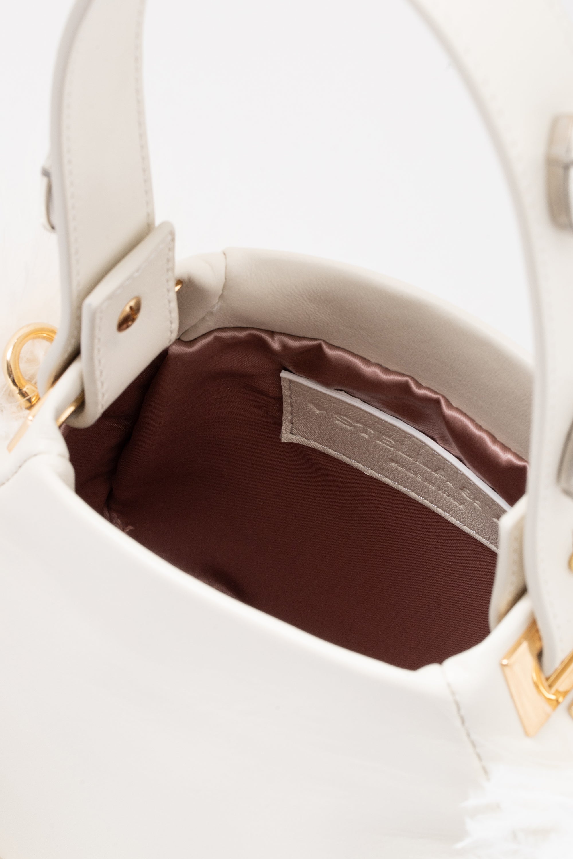 BORSA-DONNA-PELLE-BIANCA-PIUME-DETTAGLI-INTERNO-RASO-Stella_Vi_E-shop
